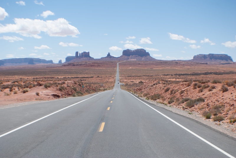 dividing line, non-urban scene, transportation, beauty in nature, no people, desert, landscape, cloud - sky, symbol, marking, environment, climate, sign