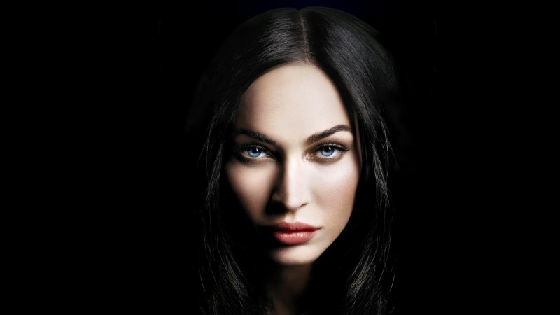 close-up, looking at camera, studio shot, human face, long hair, indoors, hairstyle, contemplation, beautiful woman, front view, black background, human body part