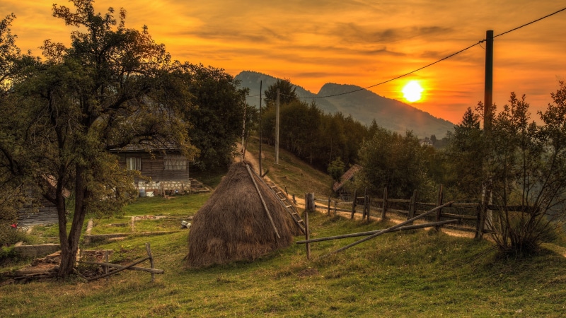 orange color, mountain range, mountain village, haystack, carpathian mountain range, tranquility, evening, transylvania, field, sunset, plant, scenics - nature