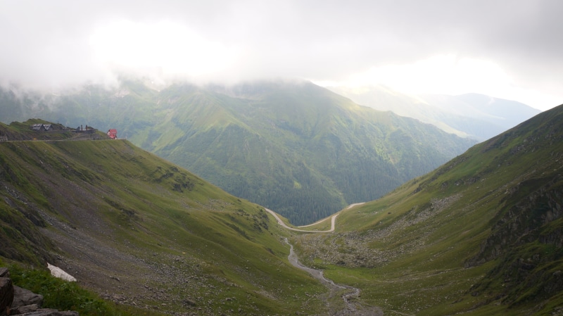 non-urban scene, cloud - sky, summer, scenic, mountain peak, altitude, nature, no people, sky, environment, serpentine, fog, valley, road, highland, tranquil scene