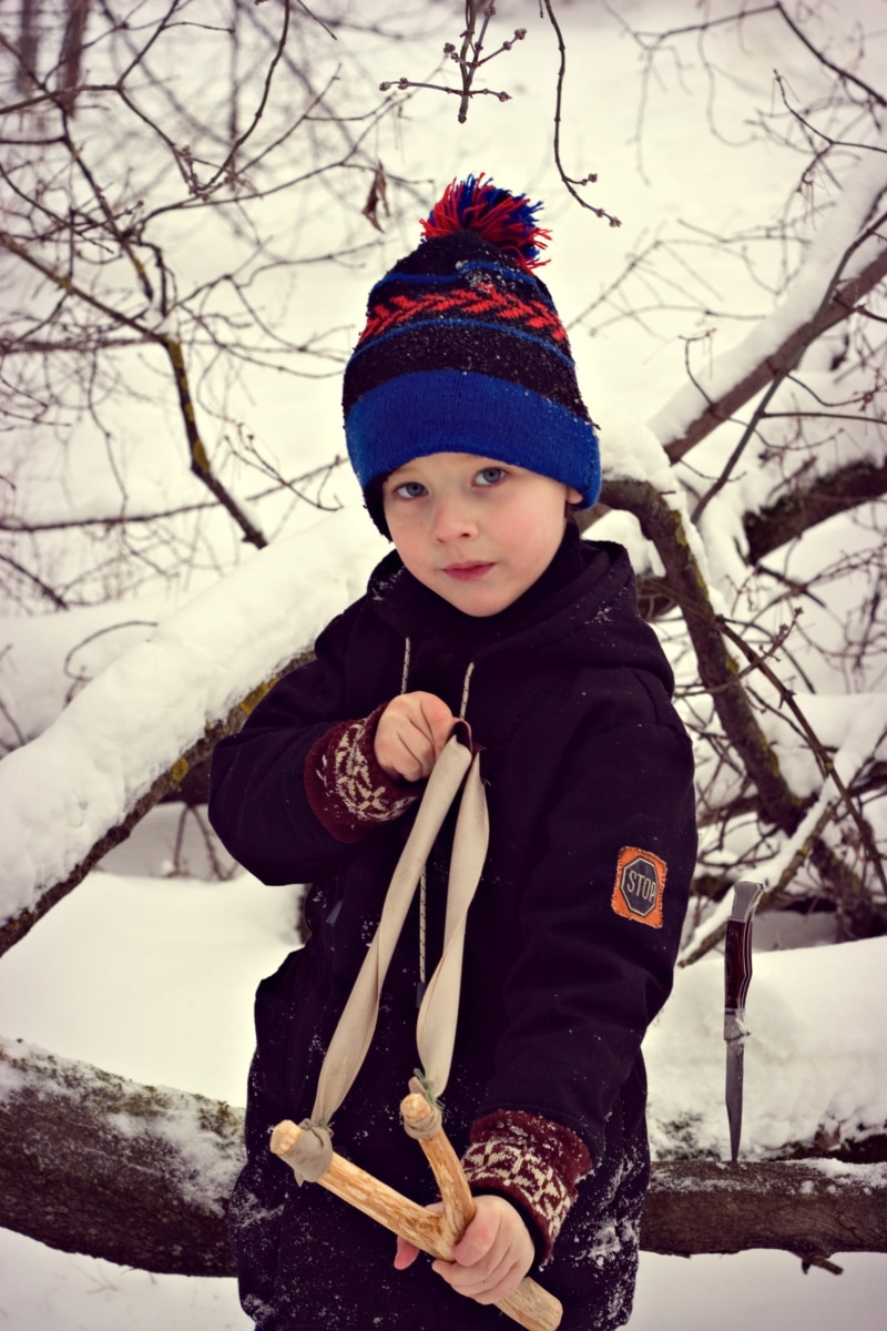 snowdrift, outdoors, one person, real people, bully, baby, knit hat, forest, scarf, 2K, tree, males, cold temperature, warm clothing, snow, teen, winter