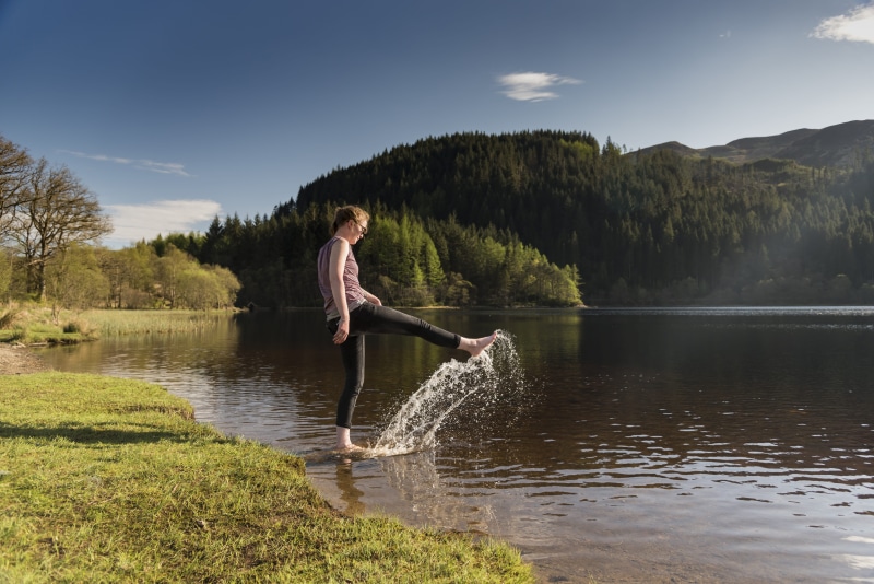 real people, water, nature, plant, scenics - nature, reflection, lifestyles, 5K, casual clothing, one person, kicking, splashing, sky, beauty in nature