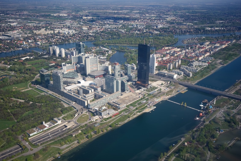 transportation, building exterior, view, skyscraper, vienna international centre, future, wien, travel destinations, cityscape, river, tourism, buildings