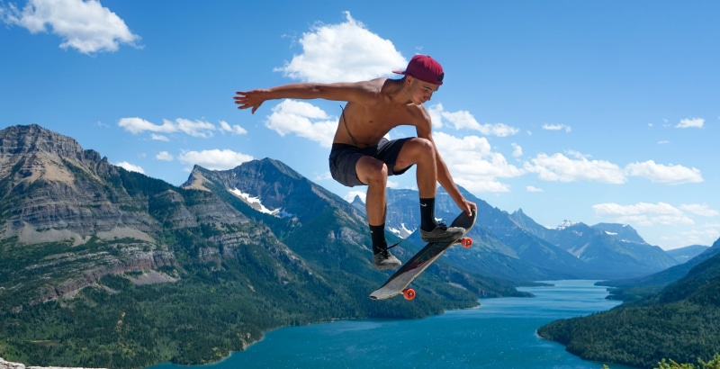 vacations, albertum, human arm, canada, skateboard, one person, motion, full length, background, stunts, jumping, mountains, rocky mountain, human limb