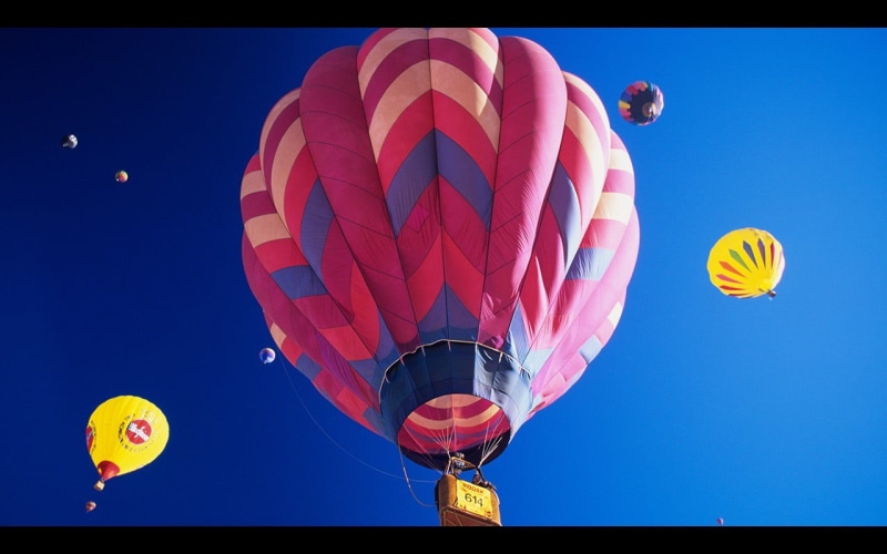 720P, clear sky, nature, multi colored, air vehicle, pink, event, traditional festival, hot air balloons, no people, mid-air, balloon, flying, red, blue