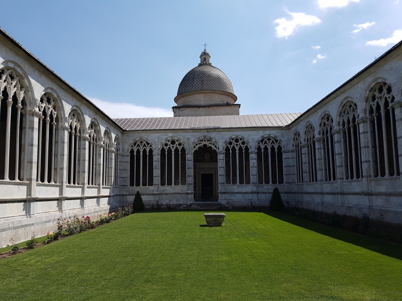 grass, sky, religion, nature, field, day, toscana, cemetery, building exterior, no people, spirituality, travel destinations, plant, pisa, place of worship