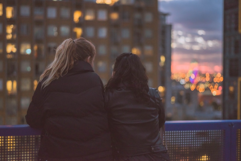 outdoors, people, love, retro, focus on foreground, building exterior, bonding, city life, cityscape, city, illuminated, portrait, girls, night, bokeh