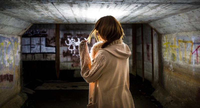 day, architecture, rear view, standing, looking, hoods, contemplation, abandoned, young adult, women, graffiti, indoors, brunette, hairstyle, waist up