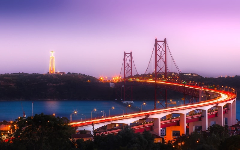 outdoors, city lights, clouds, dusk, bay, vehicle, street, sea, photography, cityscape, bridge - man made structure, birds, office building exterior, connection