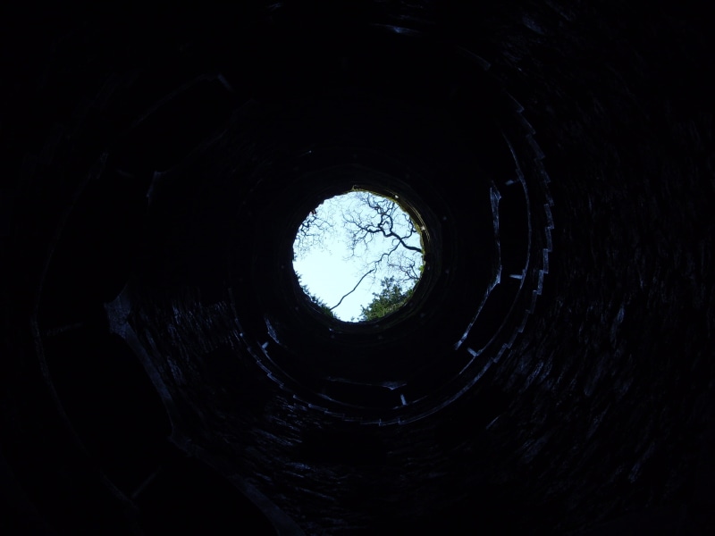light at the end of the tunnel, nature, directly below, worms, tunnel, day, hole, underground, pattern, geometric shape, built structure, eyeview, excavation