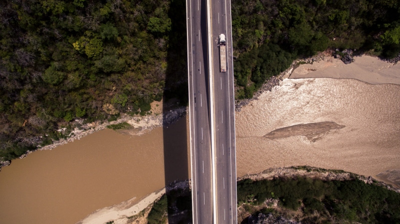road, drone, eyeview, motorway, concrete, 4K, metal, nature, white, sunlight, reflection, built structure, river, outdoors, roadway, gray, water, mountain