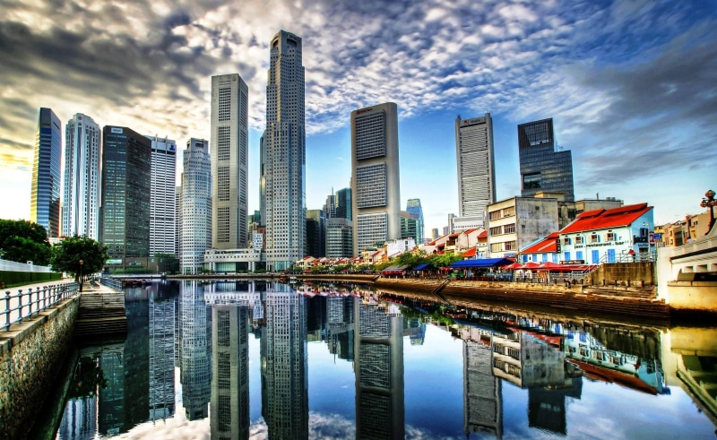 skyscraper, buildings, urban skyline, office building exterior, architecture, river, sky, cityscape, tall - high, financial district, built structure, reflection