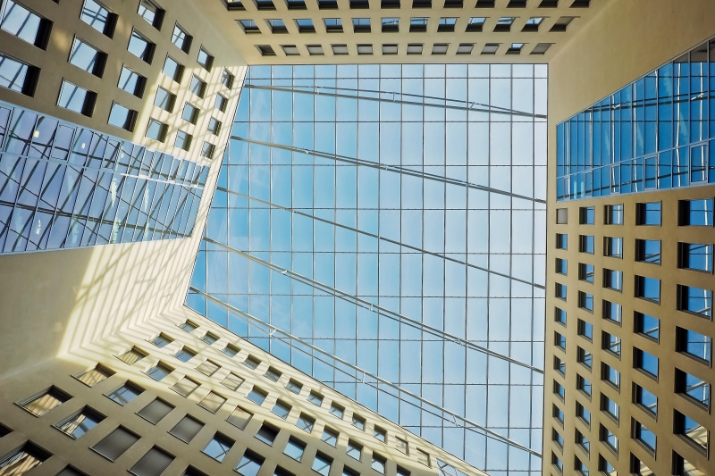 skyscraper, reflection, courtyard, finance, modern high rise building, modern building, office building, facade, geometric shape, window, blue, day, clouds