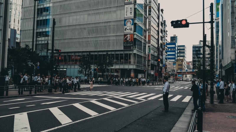 symbol, group of people, crossing, road marking, outdoors, architecture, building, people, sign, building exterior, large group of people, city street