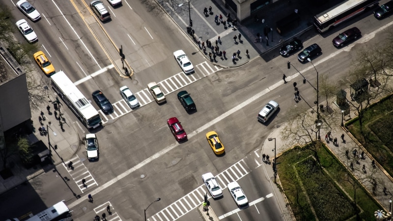 sign, symbol, crosswalk, traffic, road marking, day, incidental people, crossing, marking, outdoors, road, car, high angle view, motor vehicle, top view
