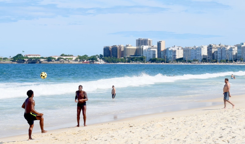 vacation, outdoors, men, water, sky, sand, building exterior, group of people, destination, copacabana, sea, land, holiday, rio, adult, beach soccer, day