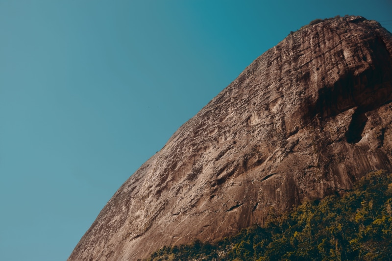 copy space, blue, scenics - nature, sugar loaf, climbing, mountain peak, brown, no people, rock formation, solid, low angle view, sky, 5K, mountain, outdoors