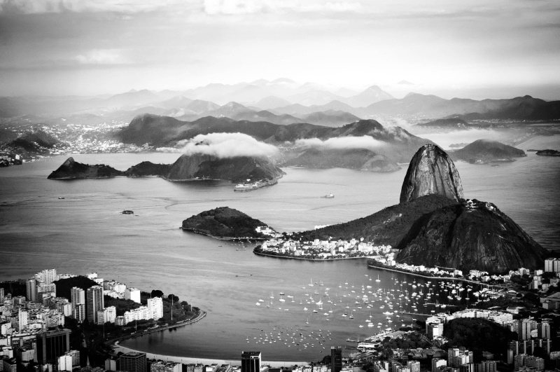 mountain, architecture, mist, island, landscape, near, urban, outdoors, photography, sugarloaf mountain, nature, building, ocean, sea, built structure
