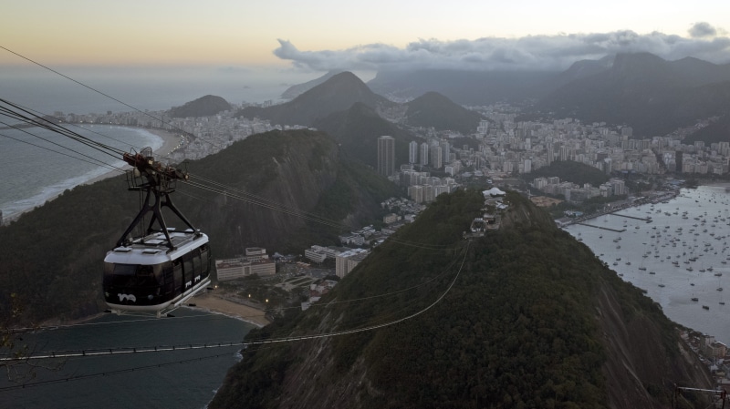 white, transportation, beach, sky, landscape, gondola, day, land, brazil, fog, mountain range, building exterior, cable car, snow, mood, travel destinations