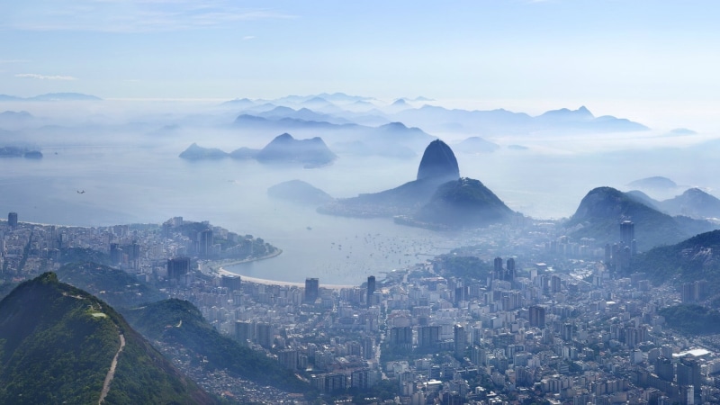 fog, high angle view, tourist attraction, no people, beauty in nature, botafogo beach, sky, travel destinations, rio de janeiro, building, hill station