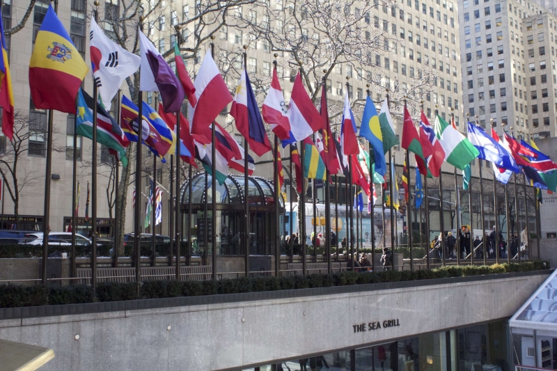 building, rockefeller center, street, road, flag, canal, architecture, built structure, independence, transportation, 4K, day, multi colored, nature, choice