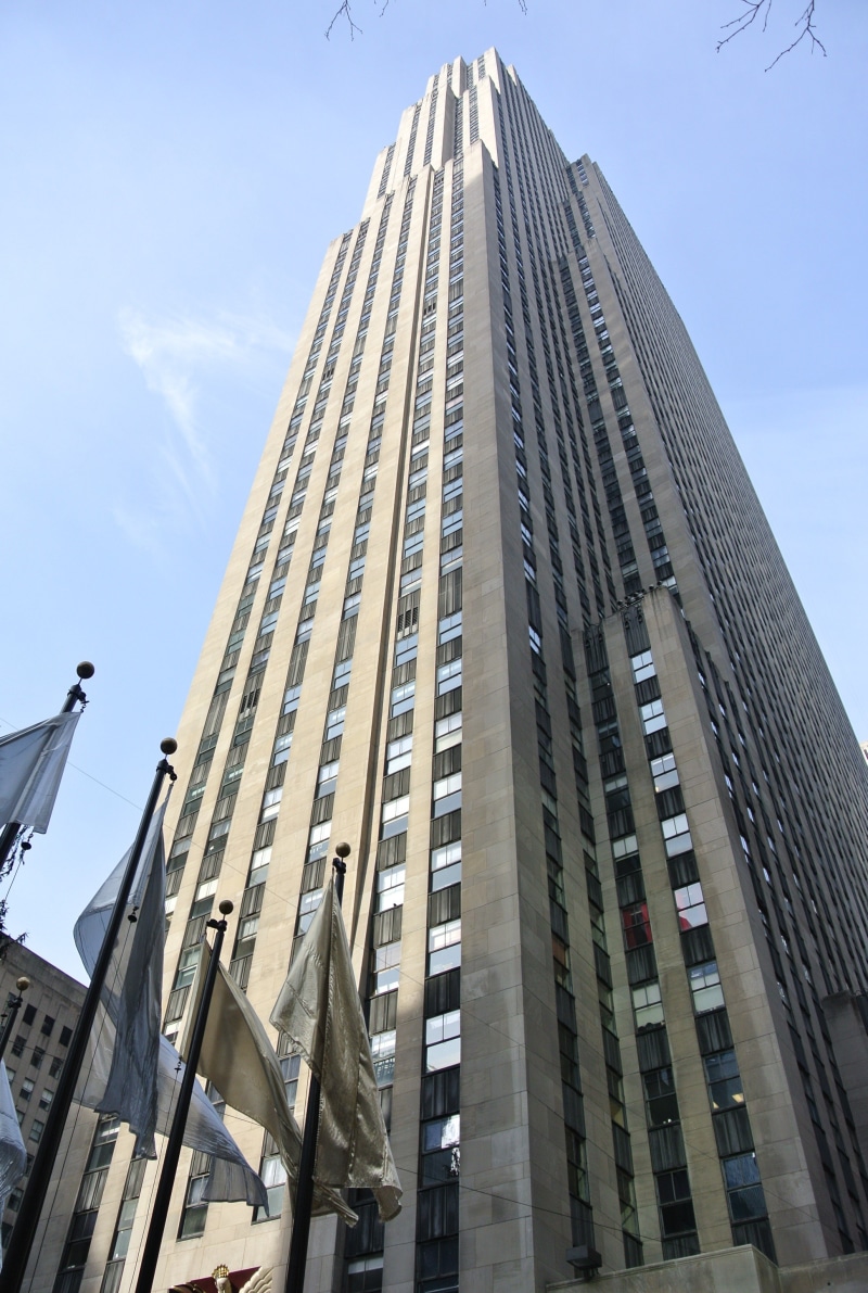 office building exterior, outdoors, no people, top of the rock, building exterior, cloud - sky, low angle view, landmark, tall - high, day, america, building