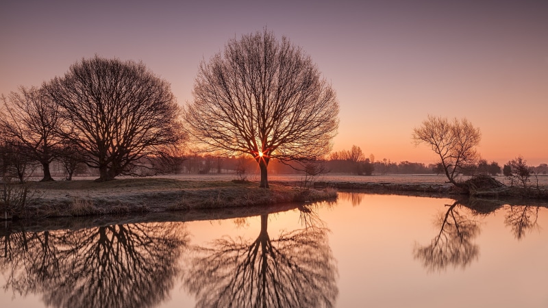 beauty in nature, tranquil scene, outdoors, orange color, reflection, sunset, nature, water, england, sky, herringfleet, reflection lake, evening, atmosphere