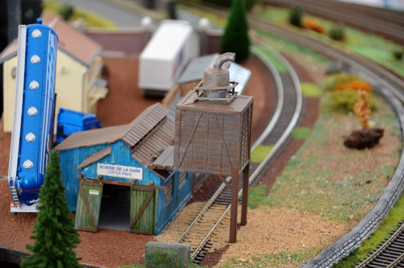 selective focus, railroad track, train, focus on foreground, metal, nature, wagon, miniature, business, representation, blue, landscape, land, sawmill