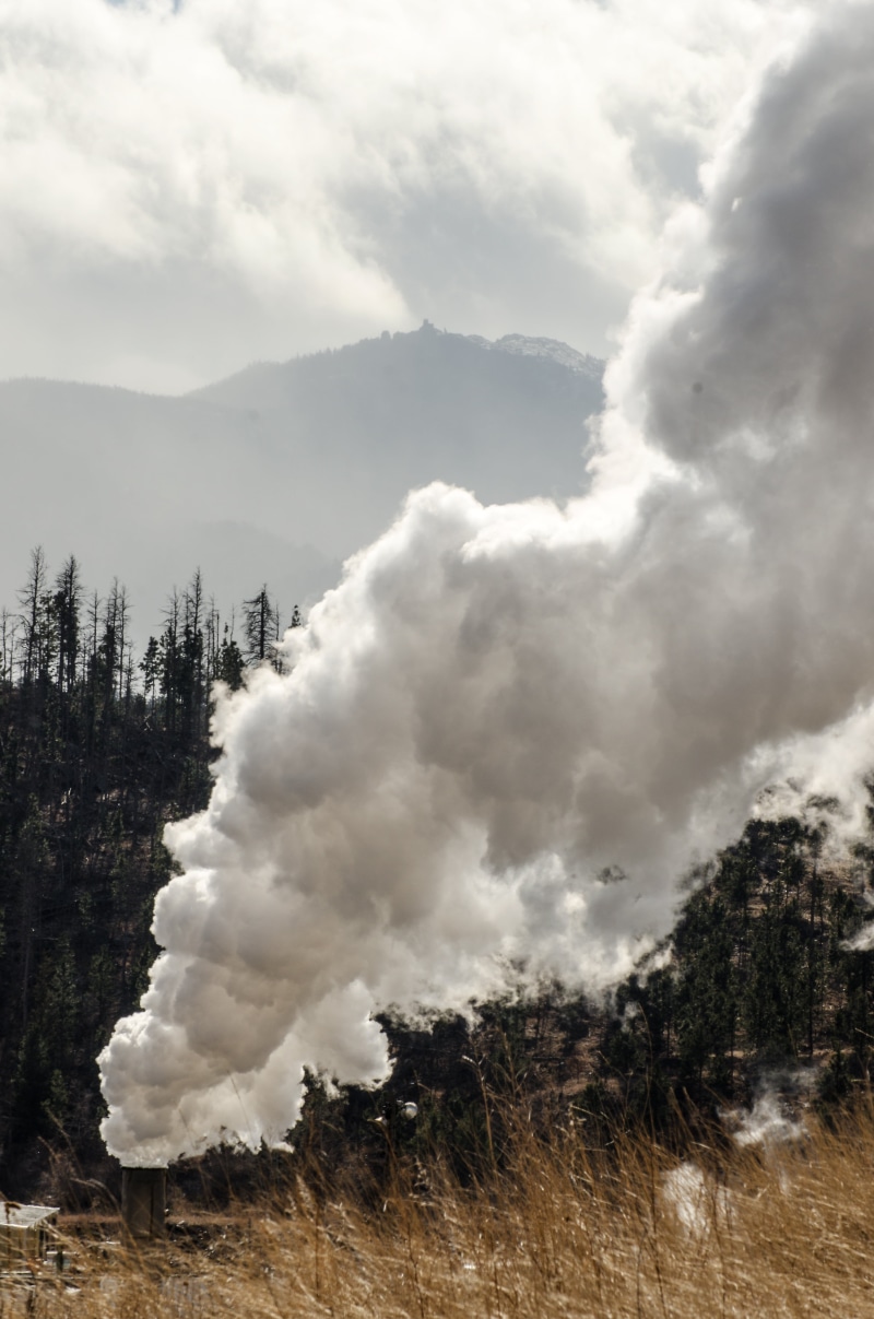 scenics, outdoors, plant, industrial, equipment, emitting, beauty in nature, log, sawmill smokestack, hills, cloud - Sky, no people, landscape, lumberyard