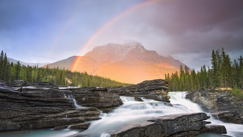 waterfall, flowing water, land, no people, flowing, outdoors, rock - object, reflection, rainbow, water, non-urban scene, phenomenon, nature, environment
