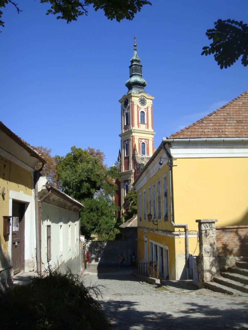 spire, sky, belgrade cathedral, szentendre, religion, no people, clear sky, tower, blue, 2K, sunlight, spirituality, place of worship, tree, day, built structure