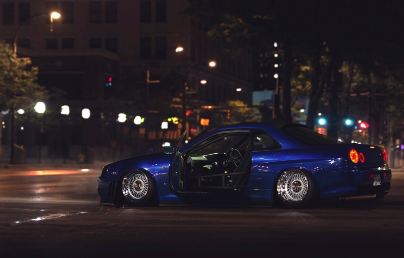 R34, transportation, Skyline, modern, built structure, supercar, shiny, Low, lighting equipment, mode of transportation, outdoors, land Vehicle, city life