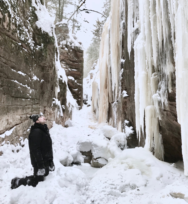 adventure, travel, forest, warm clothing, people in nature, ice, one person, lifestyles, flume gorge, landscape, real people, day, winter, rear view, leisure activity