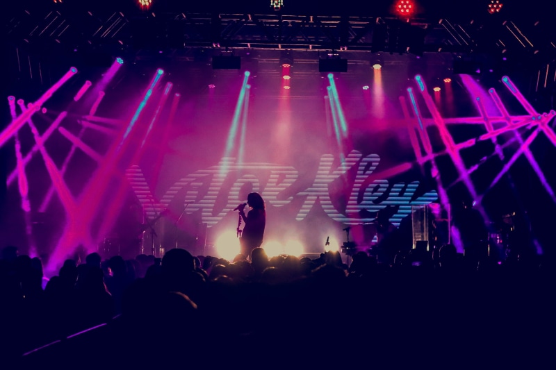 2K, popular music concert, stage, large group of people, event, nightlife, human, lighting, music band, night, lighting equipment, arms raised, standing