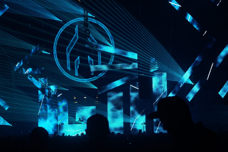 night life, cyan, concert, adult, stage, music, motion, leisure activities, big, rave, blue, lifestyles, real people, event, enjoyment, festival, light