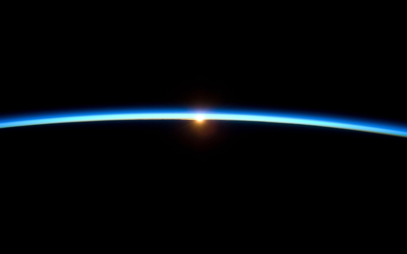 blue, horizon, light - natural phenomenon, space, planet earth, no people, International Space Station, sky, lens flare, sunrise - dawn, environment, heat - temperature