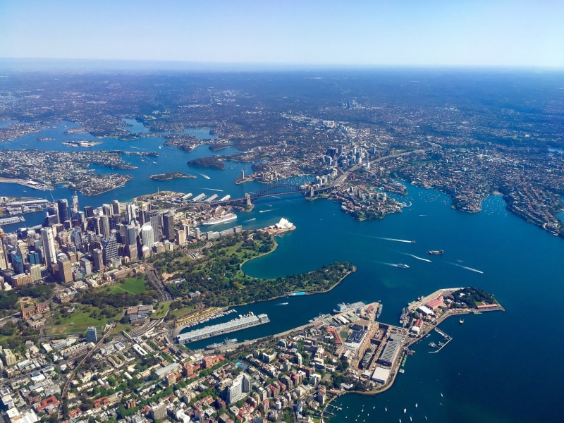 water, built structure, outdoors, buildings, sky, high angle view, city, building, skyscraper, building exterior, modern, architecture, cityscape, body