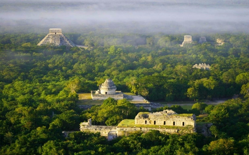 landscape nature chichen itza temple ruins archeology tropical forest mexico morning mist sunlight aerial view, 720P
