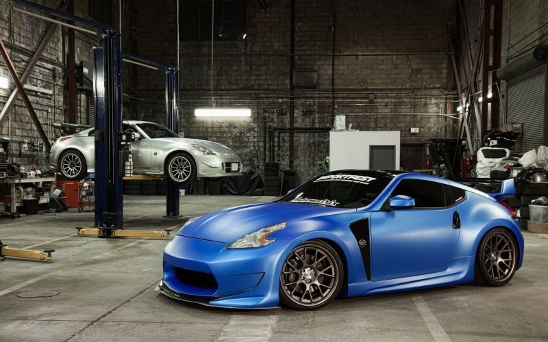 luxury, parking garage, built structure, motor vehicle, no people, Nissan 350Z, 1080P, land vehicle, Nissan 370Z, mode of transportation, blue cars, garage
