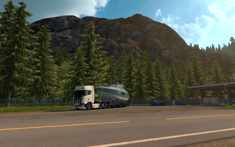 land, sky, land vehicle, mountain, video games, nature, day, Euro Truck Simulator 2, mode of transportation, motor vehicle, road marking, marking, cloud - sky