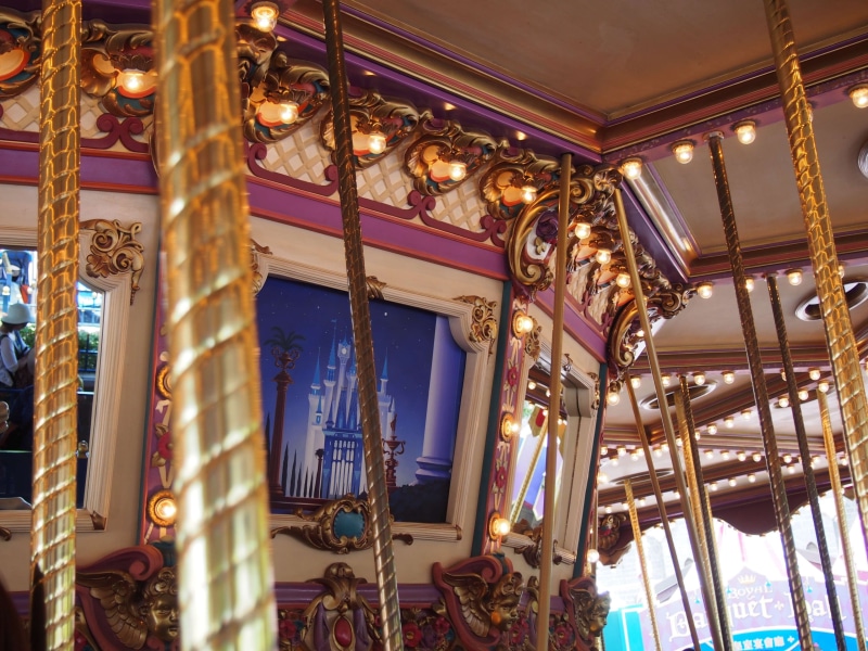 amusement park, indoors, illuminated, ceiling, theme park, low angle view, gold colored, luxury, no people, travel, ornate, music, kids, wealth, stage