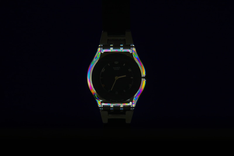 blak, lights, rainbow, black, clock, 5K, close-up, studio shot, dark, minimal, emitting, light - natural phenomenon, product, reflection, illuminated
