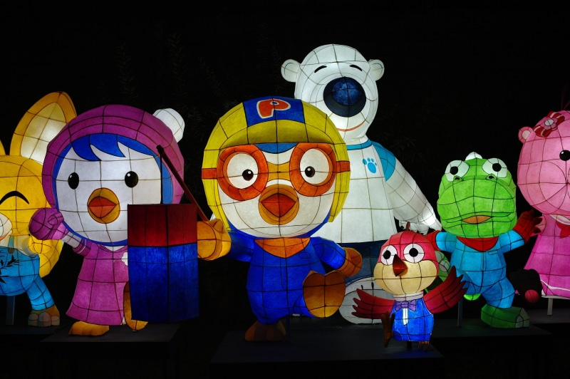 lantern, penguin, animation, art and craft, art, cheonggyecheon stream, creativity, figure, toy, human representation, crocodile, light, rivers, arts culture and entertainment