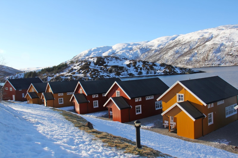 clear sky, lauklines kystferie, ski resort, fishermen cabins, outdoors, winter, mountain, cabin, mountain range, built structure, day, mountain peak, scenics - nature