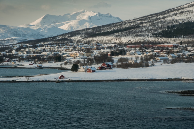 lapland, outdoors, transportation, beauty in nature, architecture, no people, waterfront, winter, building, water, tromso, mountain range, snow, cold temperature