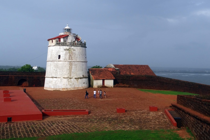 goa, 17th century, nature, outdoors, water, safety, horizon over water, men, security, direction, building exterior, lighthouse, tower, portugese fort