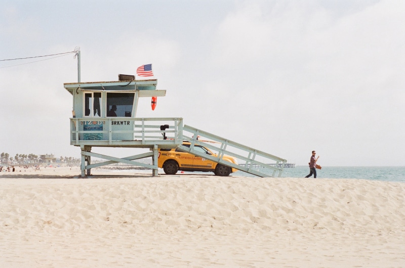man, one person, transportation, tower, occupation, outdoors, day, mode of transportation, men, lifeguard, coast, miami, beach, seashore, nature, usa, lifeguard hut