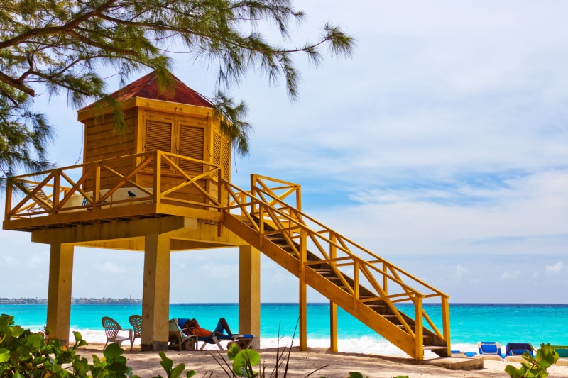 2K, real people, vacations, lifeguard hut, safety, beach, sea, day, horizon over water, sky, coastline, rescue, blue, built structure, patrol, chair, person