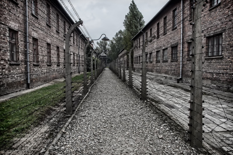no people, architecture, built structure, building, day, unesco, plant, mode of transportation, building exterior, outdoors, the jews, fence, poland, the holocaust