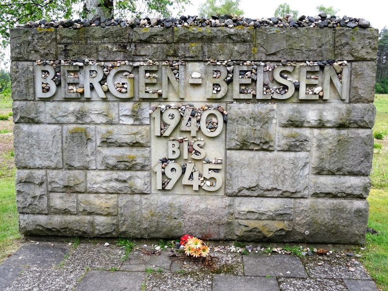 bergen-belsen, non-western script, belsen mountains, plant, history, message, day, no people, wall - building feature, wall, communication, number, script